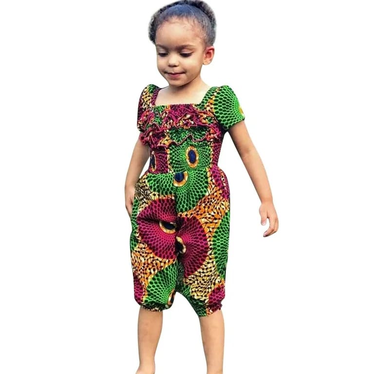 Girl in lime and magenta Ankara ruffle jumpsuit