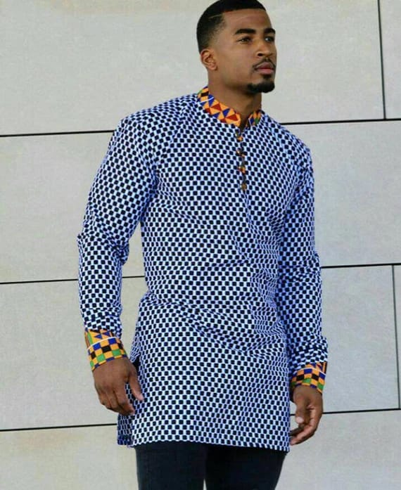 Man in blue check longline tunic with Ankara collar and cuffs
