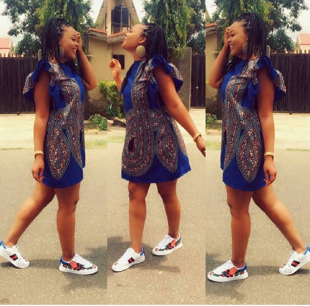 Model in royal blue Ankara mini dress with flutter sleeves